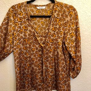 Vintage leopard print, silk, tie neck blouse.